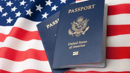 U.S. Passports on an American Stars and Stripes flag.