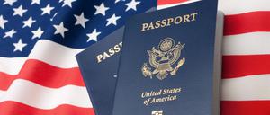 U.S. Passports on an American Stars and Stripes flag.