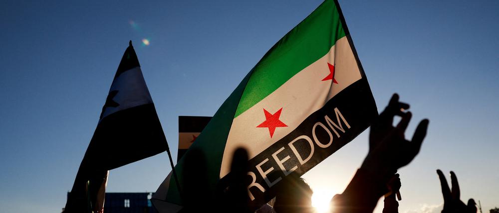 Syrer feiern den Sturz des Assad-Regimes.