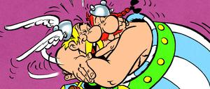 Asterix und Obelix herzen sich im Band „Die große Überfahrt“, der 1975 erschienen ist. Albert Uderzo zeichnete, René Goscinny schrieb die Texte.
