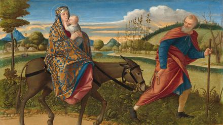 Vittore Carpaccios „Flucht nach Ägypten“ (um 1515-1518) zeigt allerliebst Josef und Maria mit dem Kind in der Natur.