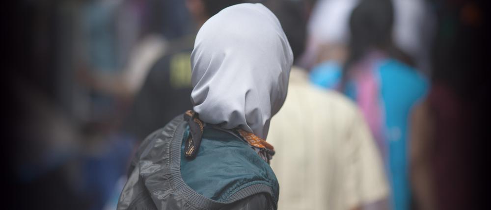 So erleben Migranten den Fall der Brandmauer.