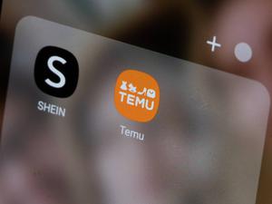 Die Icons von Shein and Temu auf einem Handy.