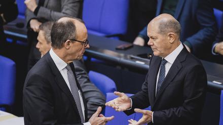 Olaf Scholz (rechts) und Friedrich Merz im Bundestag.