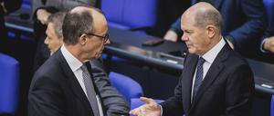 Unions-Fraktionschef Friedrich Merz und Bundeskanzler Olaf Scholz bei einer Sitzung des Deutschen Bundestages.
