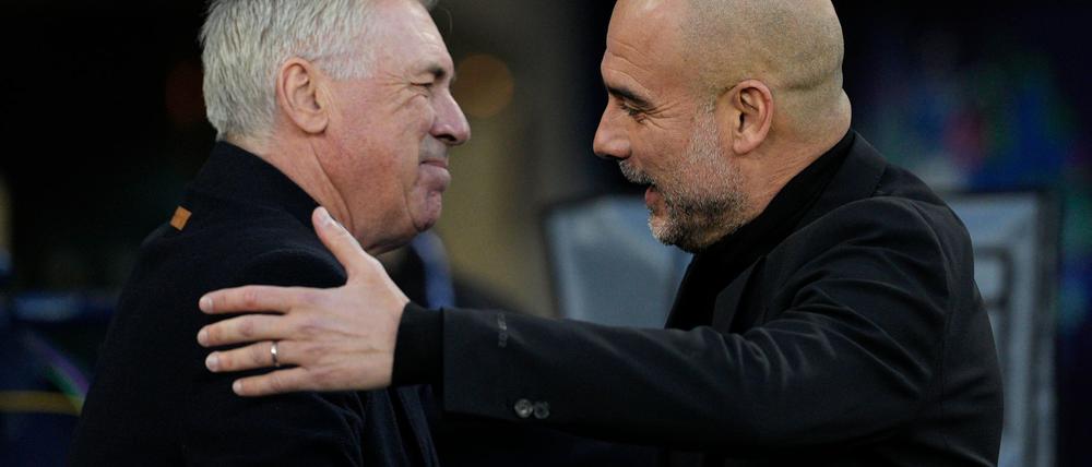 Wiedersehen in der Champions League: Pep Guardiola (r) von Manchester City und Carlo Ancelotti von Real Madrid.