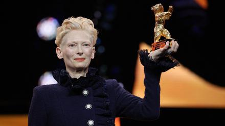 Scottish actress Tilda Swinton poses on stage after having been presented with the Honorary Bear of the Berlinale during the opening ceremony ahead of the screening of the film “Das Licht“ (The light) in the "Berlinale special" section of the 75th Berlinale, Europe's first major film festival of the year, in Berlin on February 13, 2025. (Photo by Ronny HARTMANN / AFP)