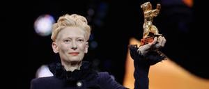 Scottish actress Tilda Swinton poses on stage after having been presented with the Honorary Bear of the Berlinale during the opening ceremony ahead of the screening of the film “Das Licht“ (The light) in the "Berlinale special" section of the 75th Berlinale, Europe's first major film festival of the year, in Berlin on February 13, 2025. (Photo by Ronny HARTMANN / AFP)