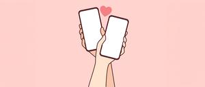Eine Illustration zeigt zwei Hände, die Smartphones halten. Darüber ist ein Herz zu sehen.