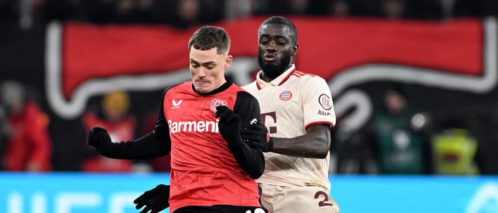 Florian Wirtz (links) und Bayerns Dayot Upamecano treffen auch in der Champions League aufeinander. 