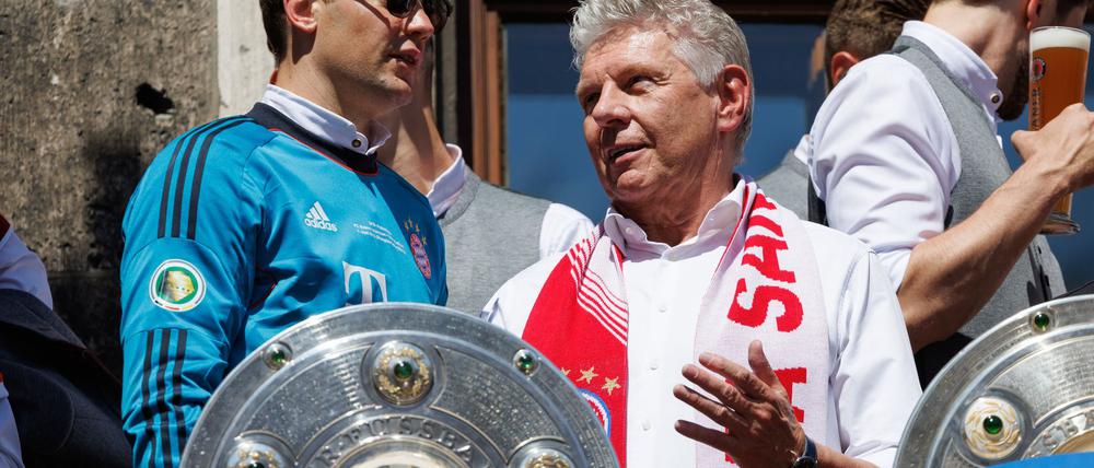 Münchens Oberbürgermeister Dieter Reiter (rechts) geht davon aus, bald wieder mit den Bayern auf dem Balkon zu stehen.