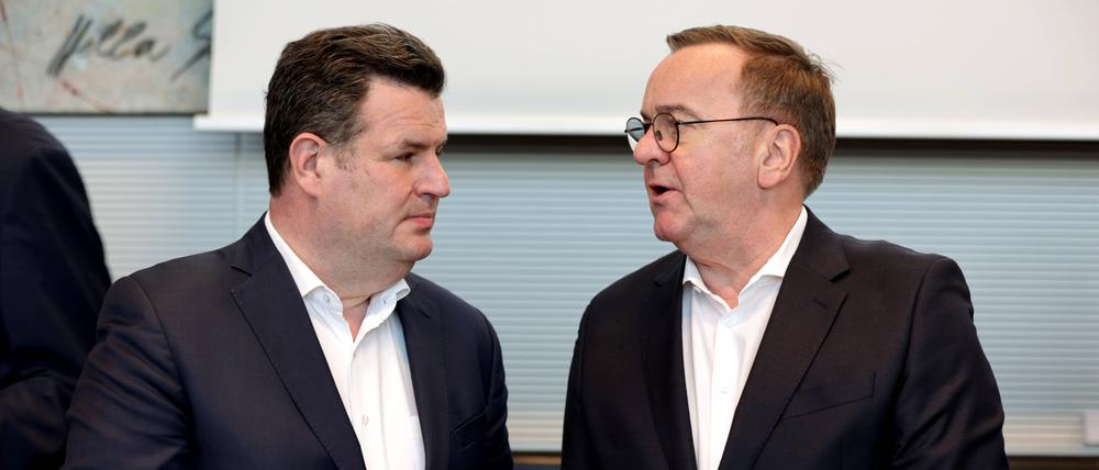 Die SPD-Politiker und Bundesminister Hubertus Heil (links) und Boris Pistorius.