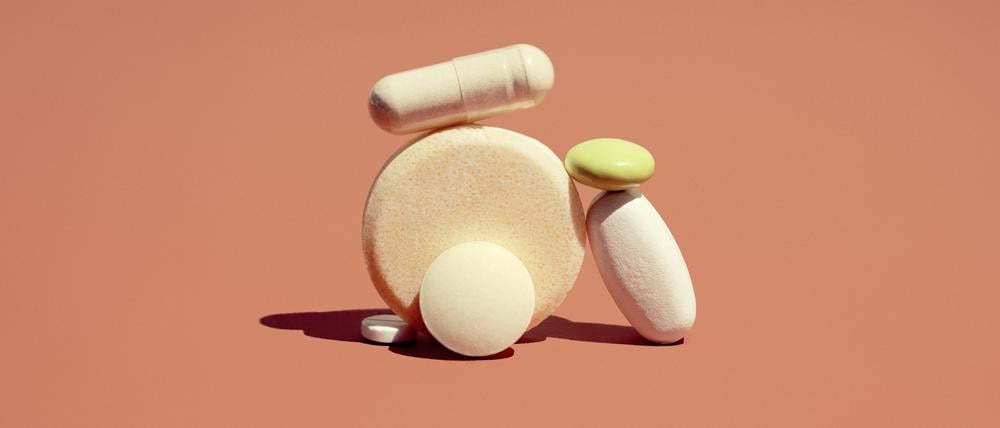 A group of pharmaceutical drugs pills laid in a pile