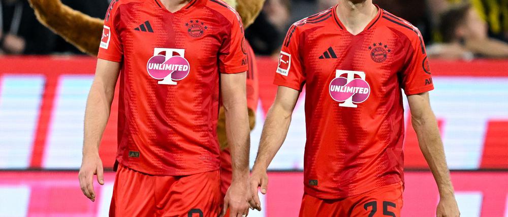 Harry Kane (l) und Thomas Müller - glückt die Wende in Mailand?