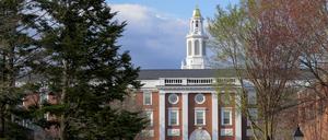 FILE PHOTO: People walk on the Business School campus of Harvard University in Cambridge, Massachusetts, U.S., April 15, 2025.   REUTERS/Faith Ninivaggi//File Photo