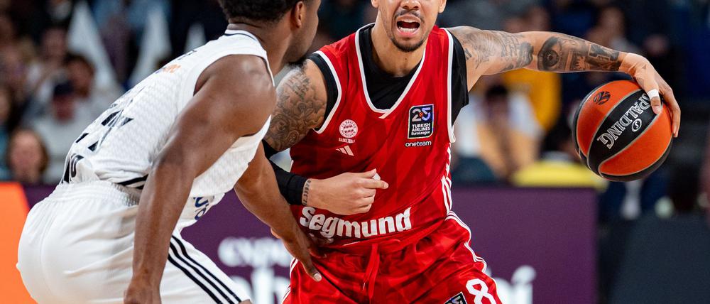 Shabazz Napier (r) war gegen Madrid bester Münchner Werfer.