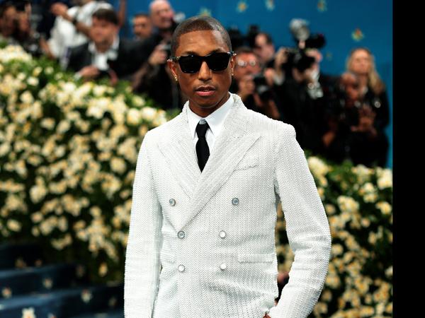 Pharrell Williams poses during the Met Gala, an annual fundraising gala held for the benefit of the Metropolitan Museum of Art's Costume Institute with this year's theme 'Superfine: Tailoring Black Style,' in New York City, New York, U.S., May 5, 2025. REUTERS/Mario Anzuoni