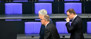 Designated Chancellor Friedrich Merz (2nd R) reacts to the result of the first round of the voting and leaves the plenary hall with the parliamentary group leader of Germany’s Christian Democratic Union (CDU) Jens Spahn (R) during a session at the Bundestag (lower house of parliament), as MPs are to elect Germany’s next Chancellor, in Berlin on May 6, 2025. (Photo by Tobias SCHWARZ / AFP) 