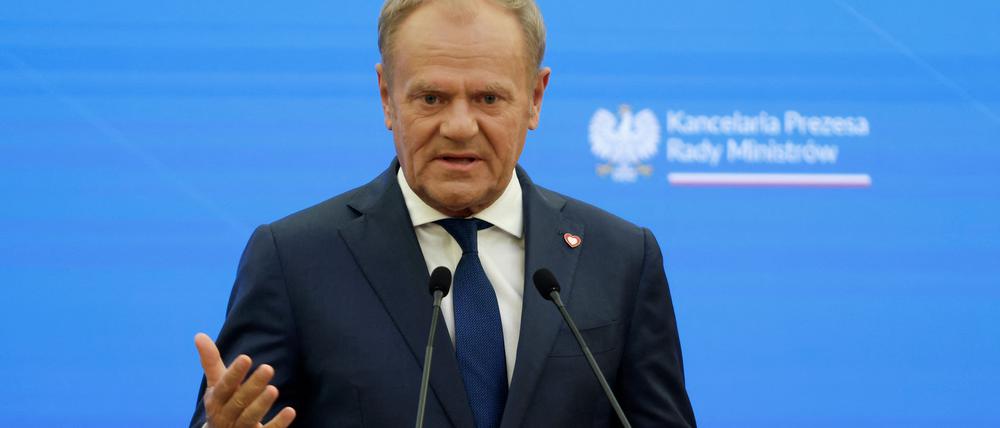 Poland's Prime Minister Donald Tusk speaks during a joint press conference with Germany's newly elected Chancellor in Warsaw on May 7, 2025. Germany's new Chancellor Merz visits Poland following his visit to France on May 7, on a mission to boost ties with the European neighbours in turbulent times. (Photo by Wojtek RADWANSKI / AFP)
