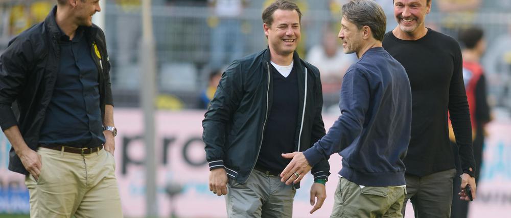 BVB-Trainer Niko Kovac (2. von rechts) erhielt viel Lob von Dortmunds Sportdirektor Sebastian Kehl (l) und Geschäftsführer Lars Ricken.
