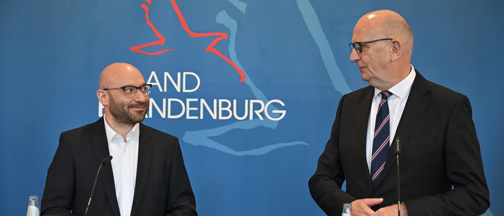 Brandenburgs neuer Innenminister René Wilke, und Ministerpräsident Dietmar Woidke.