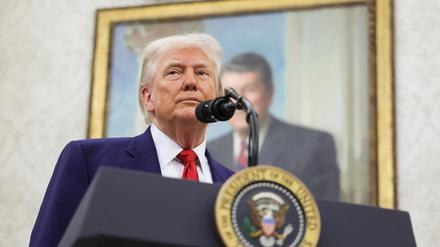 U.S. President Donald Trump looks on as he takes questions from the press during a swearing-in ceremony for the interim U.S. Attorney for the District of Columbia, Jeanine Pirro, at the White House in Washington, D.C., U.S., May 28, 2025. REUTERS/Leah Millis