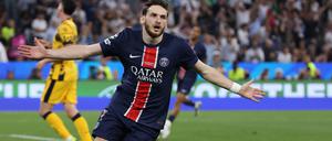 Paris Saint-Germain's Georgian forward #07 Khvicha Kvaratskhelia celebrates after scoring PSG's fourth goal during the UEFA Champions League final football match between Paris Saint-Germain (PSG) and Inter Milan in Munich, southern Germany, on May 31, 2025. (Photo by FRANCK FIFE / AFP)