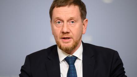 Die Länder seien sich einig in ihrer Forderung nach Ersatz ihrer Kosten, sagt der Vorsitzende der Ministerpräsidentenkonferenz, Michael Kretschmer. (Archivbild)