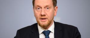 Die Länder seien sich einig in ihrer Forderung nach Ersatz ihrer Kosten, sagt der Vorsitzende der Ministerpräsidentenkonferenz, Michael Kretschmer. (Archivbild)