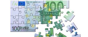 100-Euroschein als Puzzle. 