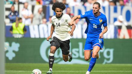 Deutschlands Karim Adeyemi (li.) machte mit guter Leistung auf sich aufmerksam.