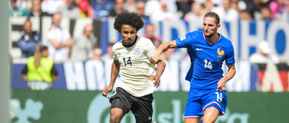 Deutschlands Karim Adeyemi (li.) machte mit guter Leistung auf sich aufmerksam.