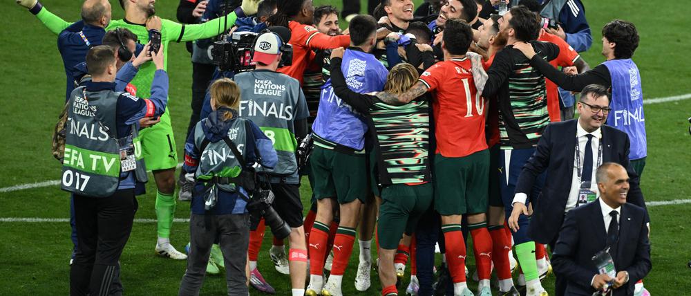 Soccer Football - Nations League - Final - Portugal v Spain - Allianz Arena, Munich, Germany - June 8, 2025
Portugal players celebrate after winning the Nations League REUTERS/Annegret Hilse