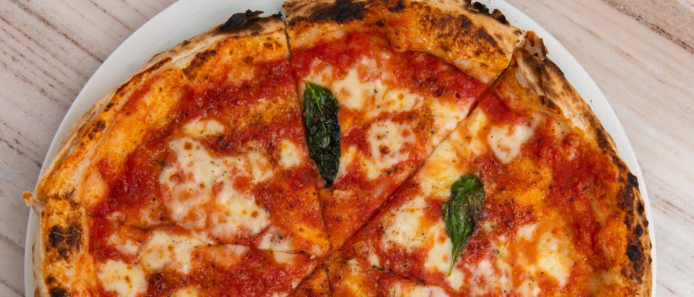 High angle view of pizza margherita on table