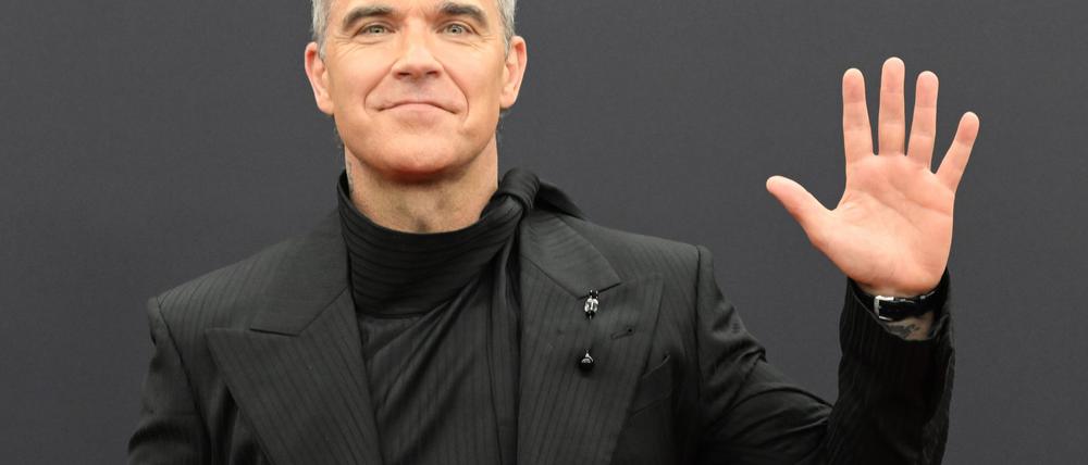 Robbie Williams hat als neuer Musikbotschafter der Fifa eine neue Hymne für den Weltfußballverband komponiert. (Archivfoto)