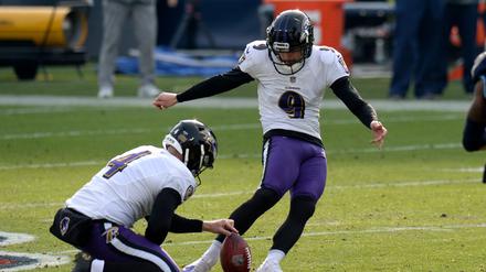 Justin Tucker (r.) spielte 13 Jahre für die Baltimore Ravens.
