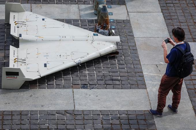 A visitor of an exhibition takes a photo of parts of an Iranian made unmanned aerial vehicle (UAV) Shahed-131/136, which was launched on Ukrainian territories, amid Russia's attack on Ukraine, in Kyiv, Ukraine June 27, 2025. REUTERS/Alina Smutko