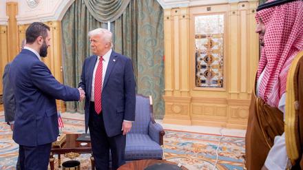 FILE PHOTO: U.S. President Donald Trump meets with Syrian President Ahmed al-Sharaa in Riyadh, Saudi Arabia, in this handout released on May 14, 2025. Saudi Press Agency/Handout via REUTERS   THIS IMAGE HAS BEEN SUPPLIED BY A THIRD PARTY/File Photo