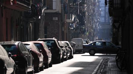 Parking chaos, Chaotic car parking scenery on the very narrow Barcelona street at early sunny morning