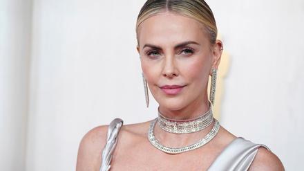 Charlize Theron sagt, sie sei sehr glücklich darüber, dass sie ihre Töchter ohne Partner an der Seite aufziehen kann. (Archivbild)