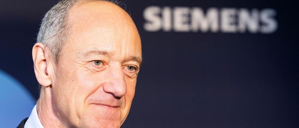 Siemens-Vorstandschef Roland Busch. Der Münchner Konzern wird von den Streitigkeiten der US-Regierung mit China in Mitleidenschaft gezogen. (Archivbild)
