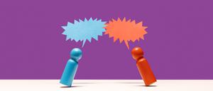 Eine blaue und eine rote Spielfigur mit Sprechblasen über den Köpfen.