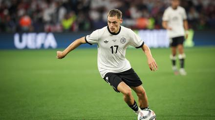 Ein Gespräch mit Red-Coach Arne Slot überzeugte Florian Wirtz vom Wechsel nach Leverkusen