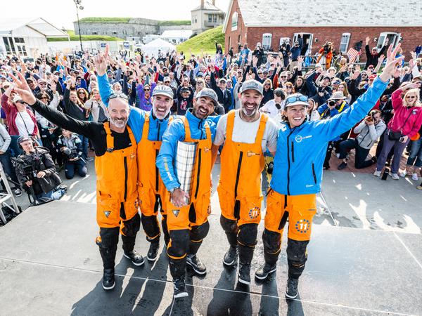After 17 days at the destination.  Damian Foxall, onboard reporter Amory Ross, skipper Charlie Enright, navigator Simon Fisher and Francesca Clapcish (from left) at the awards ceremony in the hometown of the team and its sponsor.