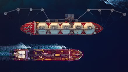 Directly above view of fuel tankers in the harbour.