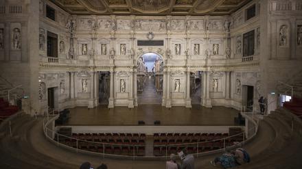 Vicenza, Italy - June 24, 2023: symmetrical interior view of Teatro Olimpico in Vicenza.   xkwx famous attraction wall european stone monument accademia olimpica ancient museum sculpture city of palladio italia palladium heritage theatrical palladio scene theatre theater italian stage olympic theater theater indoors art old column arch ceiling olympic theatre architect false perspective unesco palladian villas historic medieval culture palladian neoclassical building landmark veneto tourism renaissance vicenza italy architecture andrea palladio teatro olimpico travel