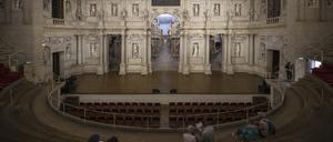 Vicenza, Italy - June 24, 2023: symmetrical interior view of Teatro Olimpico in Vicenza.   xkwx famous attraction wall european stone monument accademia olimpica ancient museum sculpture city of palladio italia palladium heritage theatrical palladio scene theatre theater italian stage olympic theater theater indoors art old column arch ceiling olympic theatre architect false perspective unesco palladian villas historic medieval culture palladian neoclassical building landmark veneto tourism renaissance vicenza italy architecture andrea palladio teatro olimpico travel