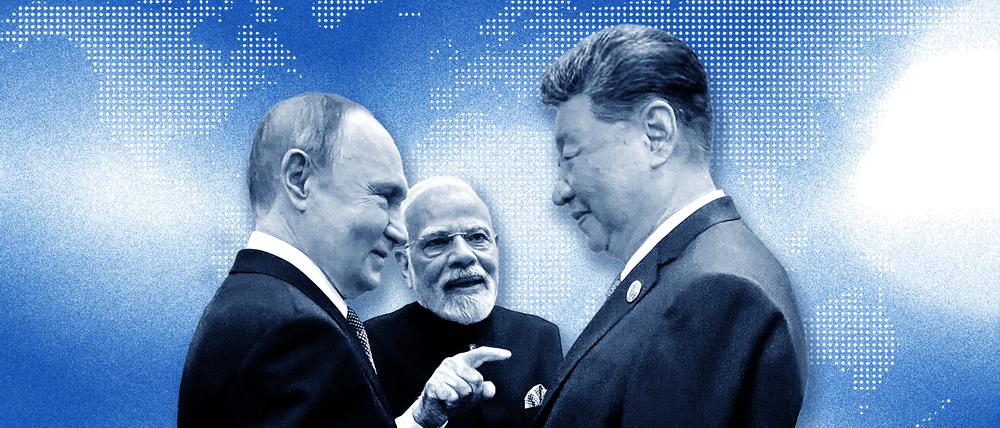 Der russische Präsident Wladimir Putin, der indische Premierminister Narendra Modi und der chinesische Präsident Xi Jinping unterhalten sich vor dem Gipfeltreffen der Shanghaier Organisation für Zusammenarbeit (SOZ) im Meijiang Convention and Exhibition Center.