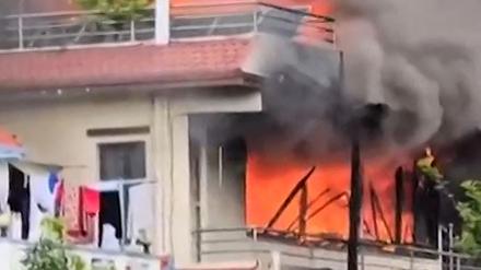 This frame grab from AFPTV video footage taken on September 9, 2025 shows smoke rising from a fire at the residence of KP Sharma Oli, who resigned after youth protesters demanded he quit as Nepal’s prime minister, in Kathmandu. Nepal’s veteran prime minister Oli resigned on September 9, a day after one of the deadliest crackdowns in years in which at least 19 people were killed. (Photo by Ujjwal Dhungana / AFPTV / AFP) 