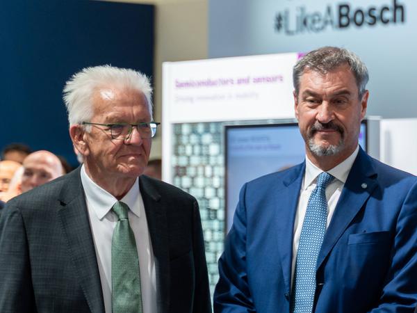 Munich, Bavaria, Germany - September 9, 2025: IAA Mobility 2025 trade fair in Munich. Tour of the trade fair, Winfried Kretschmann Bündnis 90 - Die Grünen party / Minister President - Baden-Württemberg, Dr. Markus Söder CSU party / Bavarian Minister President - Bavaria, Dr.-Ing. Stefan Hartung Chairman of the Board of Management of Robert Bosch GmbH, Friedrich Merz CDU party / Federal Chancellor and Hildegard Müller President - German Association of the Automotive Industry / VDA at the BOSCH stand *** IAA Mobility 2025 Messe in München. Messerundgang, Winfried Kretschmann Partei Bündnis 90 - Die Grünen / Ministerpräsident Baden-Württemberg, Dr. Markus Söder Partei CSU / bayrischer Ministerpräsident Bayern,